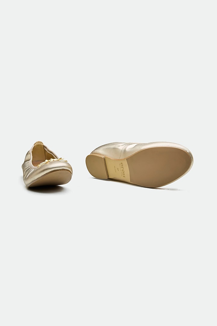 Gold Genuine Leather Metallic Bow Juttis by Oroh at Pernia's Pop Up Shop