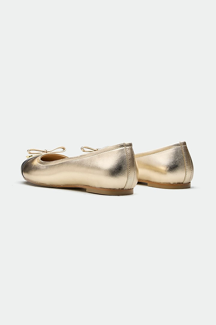 Gold Genuine Leather Bow Juttis by Oroh at Pernia's Pop Up Shop