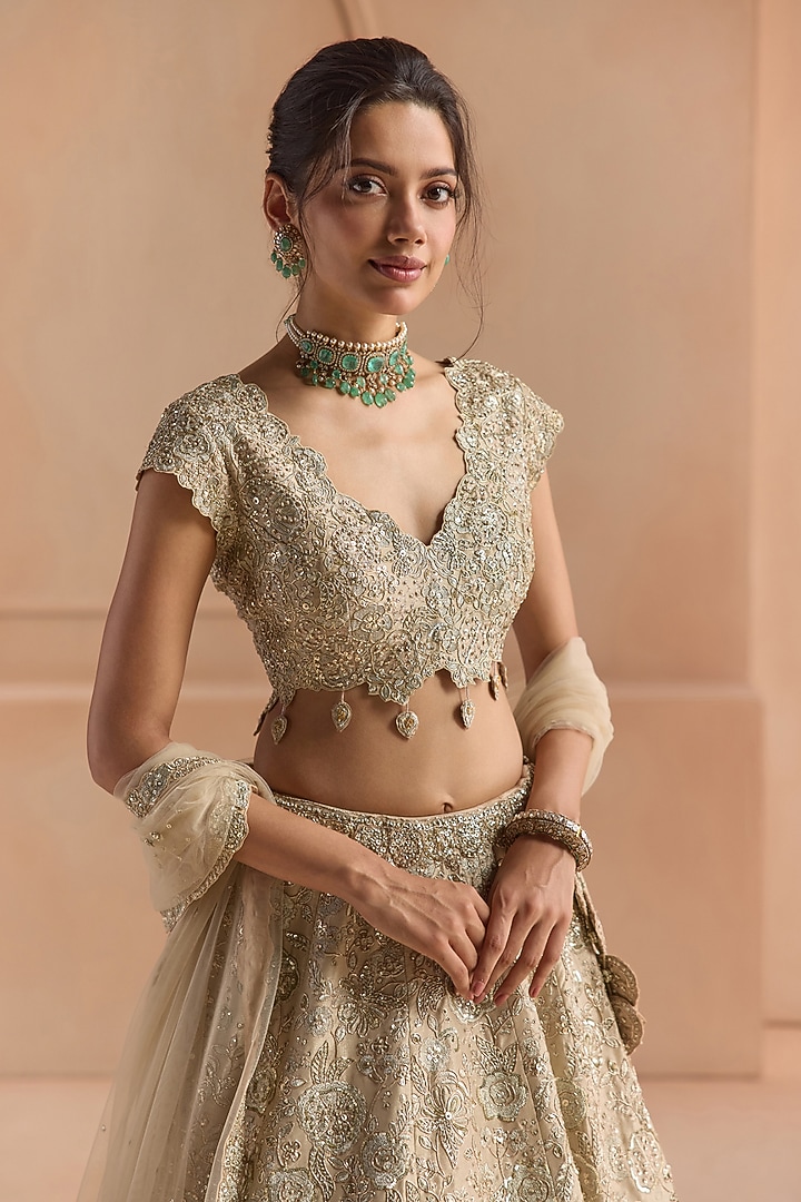 Champagne Tissue Silk Aari Embroidered Bridal Lehenga Set by Osaa By Adarsh at Pernia's Pop Up Shop