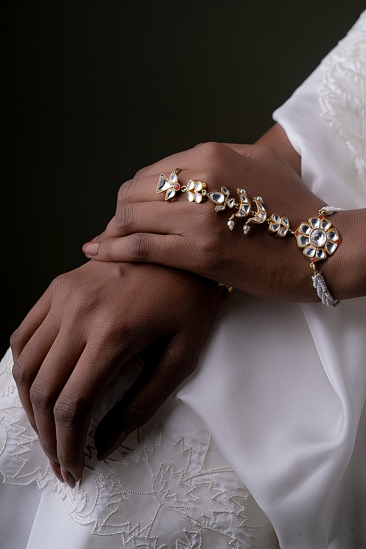 Gold Plated Kundan Polki Hathphool In Sterling Silver by OSVAG INDIA at Pernia's Pop Up Shop