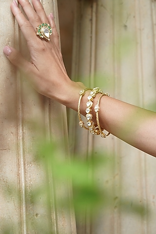 Gold Plated Kundan Polki Handcrafted Bangle In Sterling Silver by OSVAG INDIA