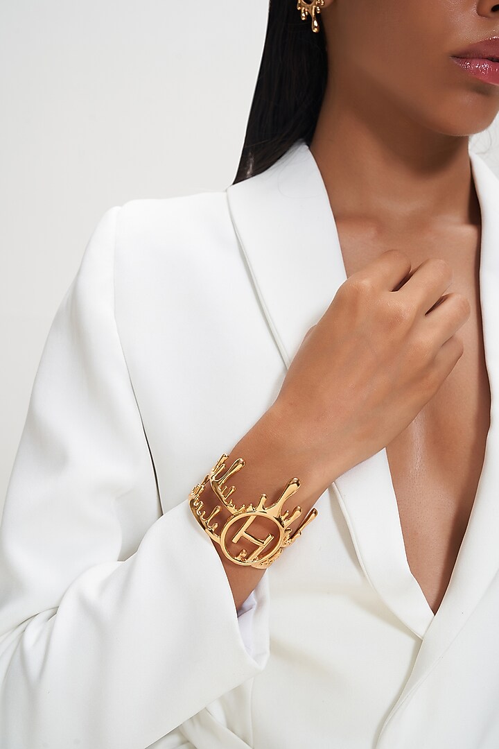 Gold Plated Free Fall Hand Cuff by Outhouse at Pernia's Pop Up Shop