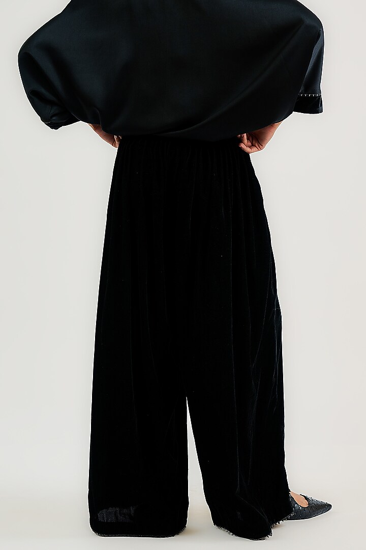 Black Velvet Pleated Trousers by OTT by Tarun Tahiliani at Pernia's Pop Up Shop