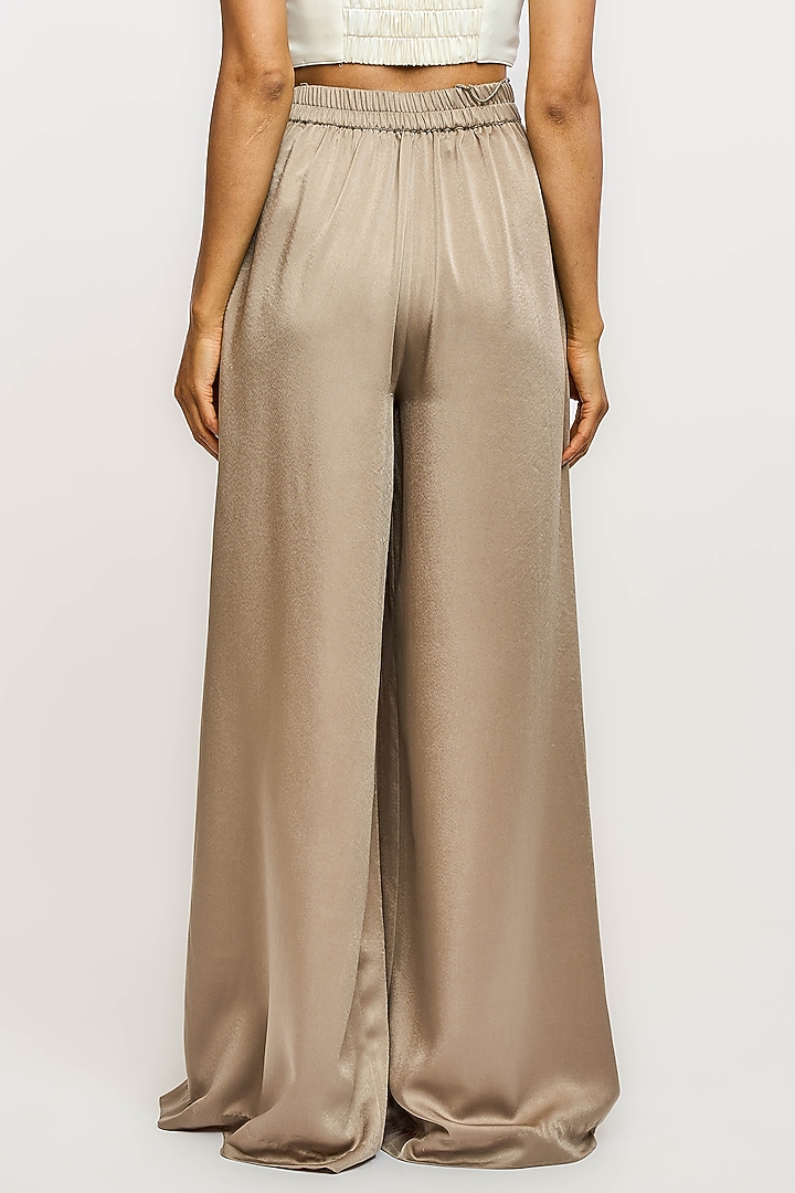 Beige Polyester Pleated Trousers by OTT by Tarun Tahiliani at Pernia's Pop Up Shop