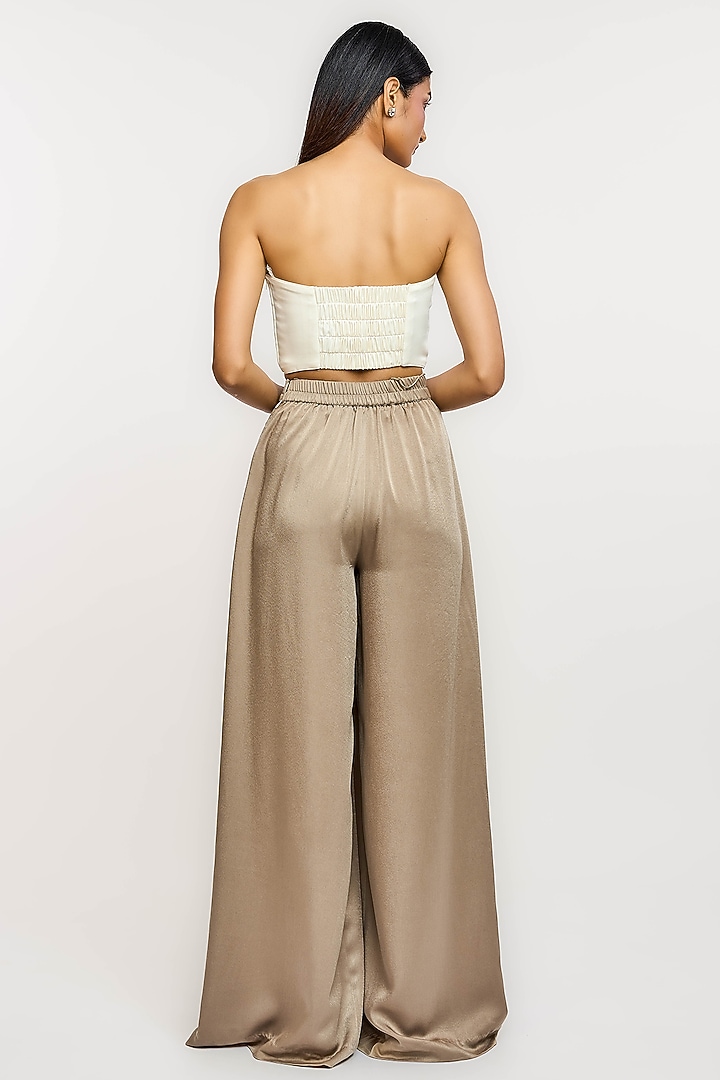 Beige Polyester Pleated Trousers by OTT by Tarun Tahiliani at Pernia's Pop Up Shop