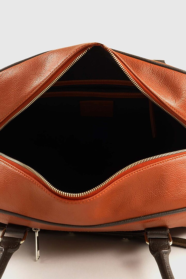 Sansa Orange Premium Faux Leather Duffle Bag by OLIVES & GOLD at Pernia's Pop Up Shop