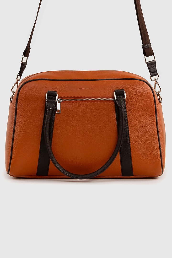 Sansa Orange Premium Faux Leather Duffle Bag by OLIVES & GOLD at Pernia's Pop Up Shop