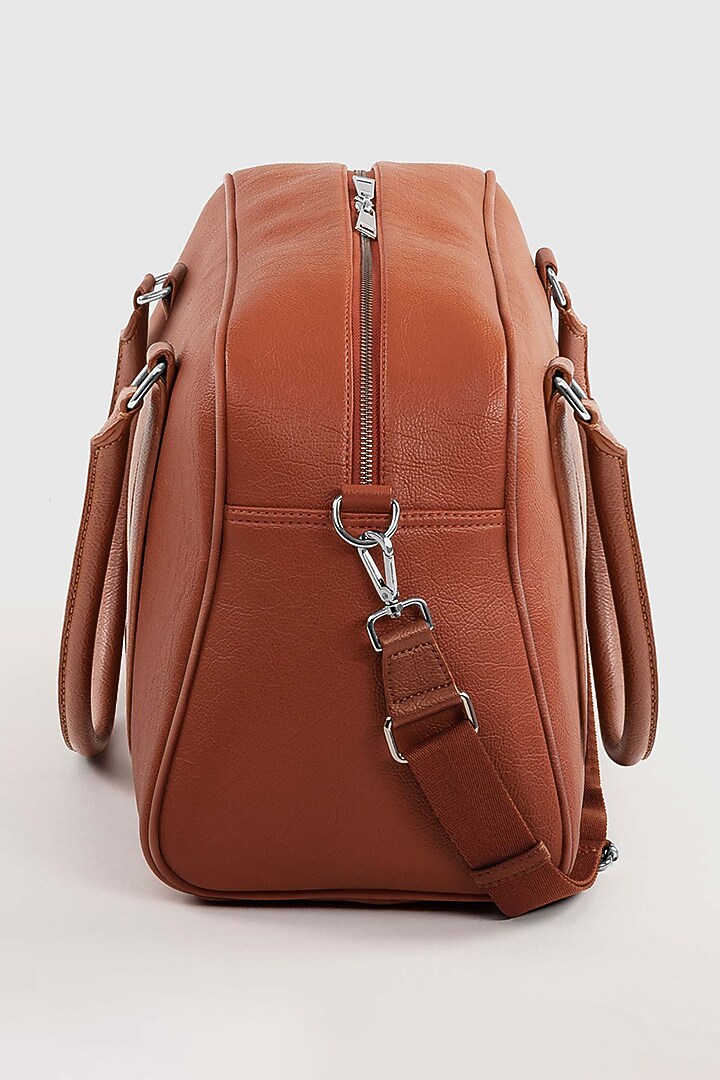 Maple Tan Premium Faux Leather Duffle Bag by OLIVES & GOLD at Pernia's Pop Up Shop