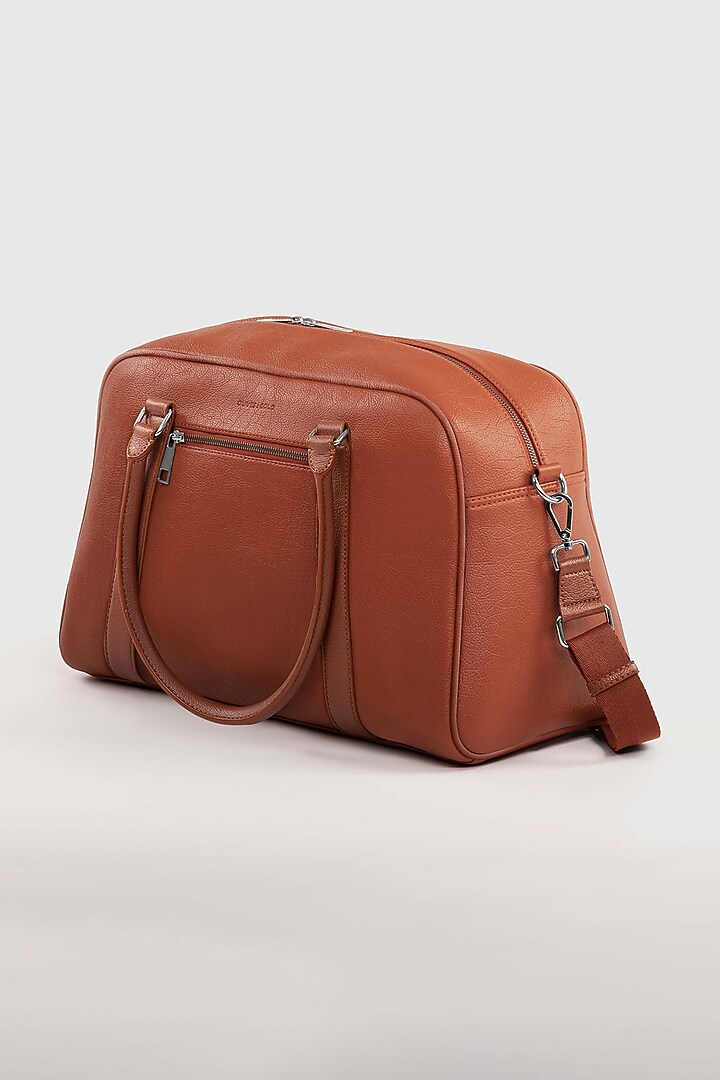 Maple Tan Premium Faux Leather Duffle Bag by OLIVES & GOLD at Pernia's Pop Up Shop