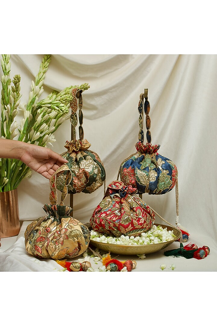 Green Fabric Printed & Hand Embroidered Potli by Ozel at Pernia's Pop Up Shop