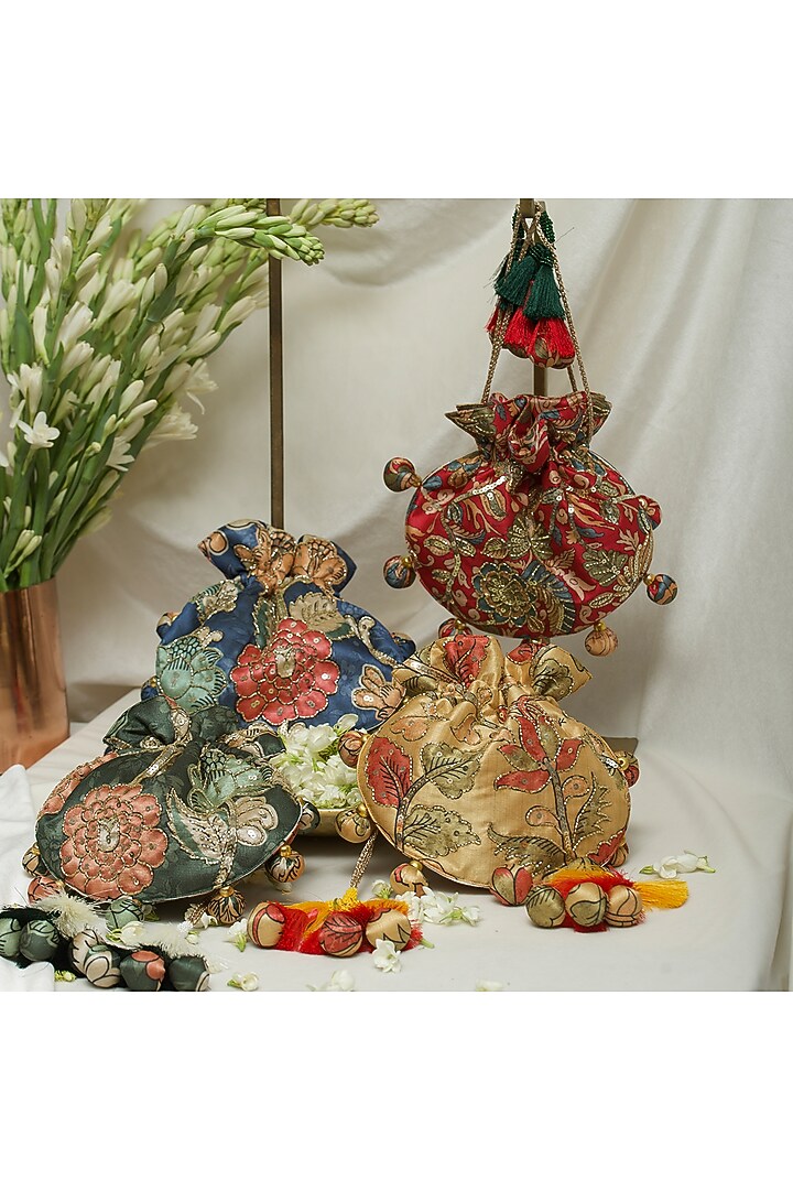 Green Fabric Printed & Hand Embroidered U-shaped Potli by Ozel at Pernia's Pop Up Shop