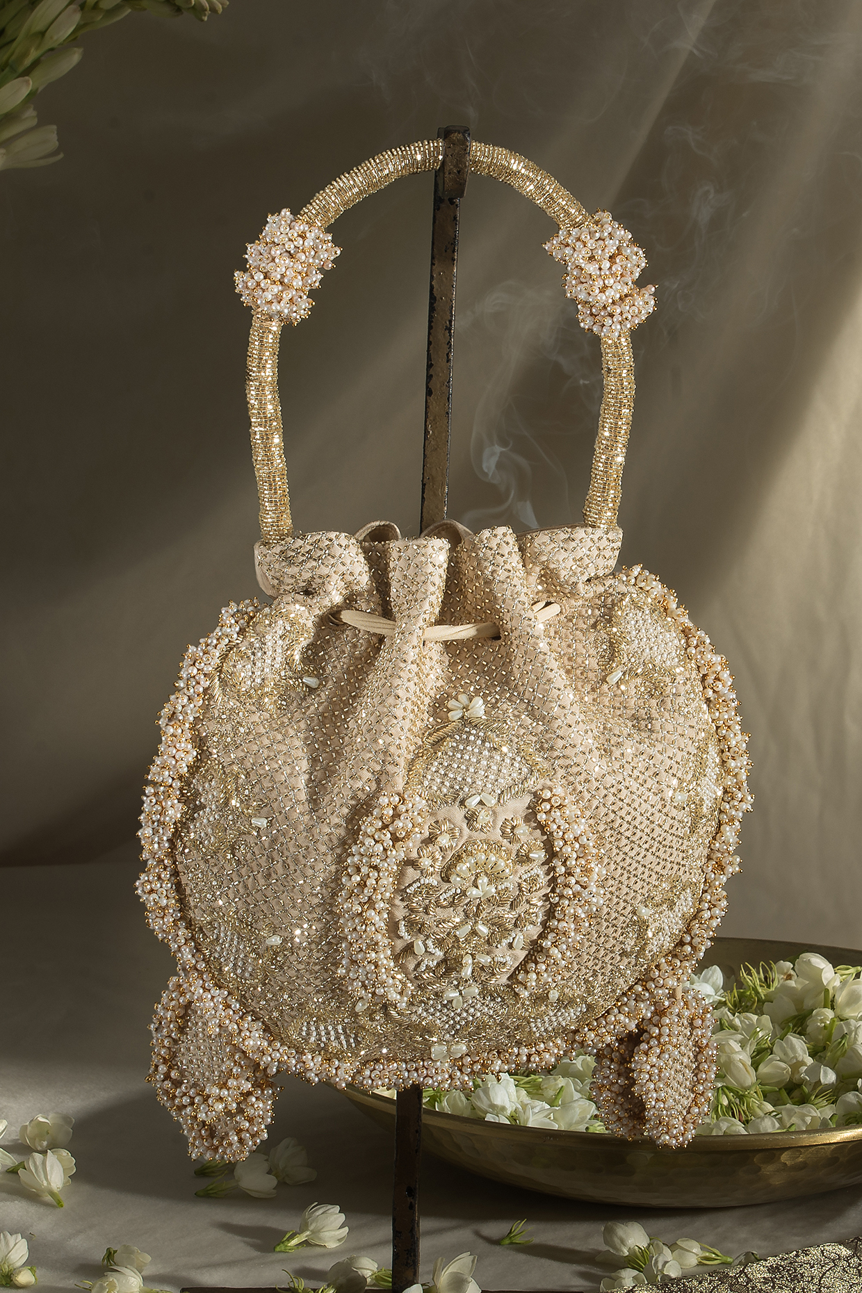Gold Fabric Embroidered Potli Design by Ozel at Pernia s Pop Up