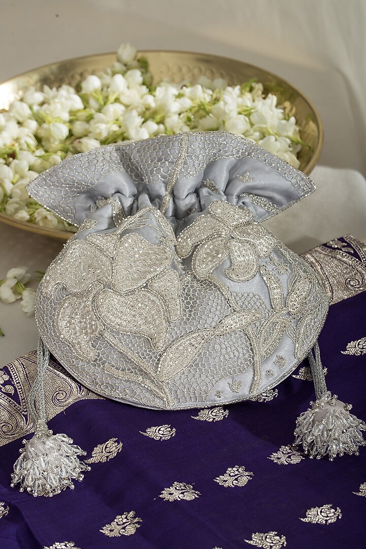 Silver Fabric Embroidered Potli by Ozel at Pernia's Pop Up Shop