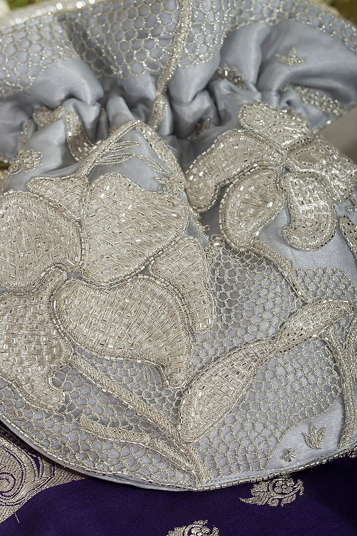 Silver Fabric Embroidered Potli by Ozel at Pernia's Pop Up Shop