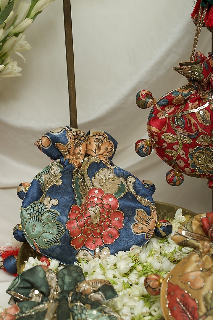 Blue Fabric Printed & Hand Embroidered U-shaped Potli by Ozel at Pernia's Pop Up Shop