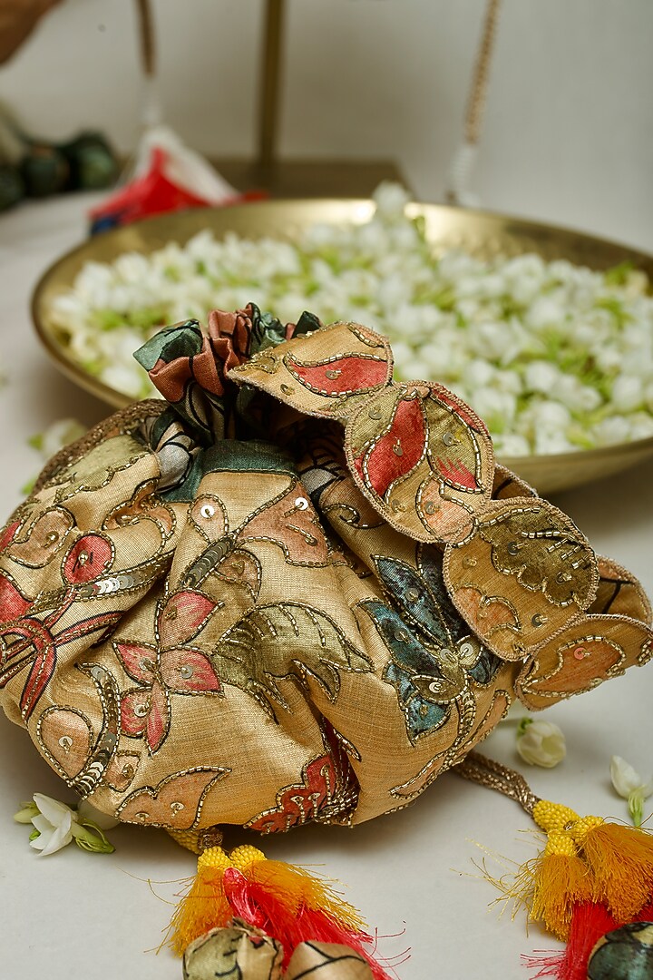 Yellow Fabric Printed & Hand Embroidered Potli by Ozel at Pernia's Pop Up Shop