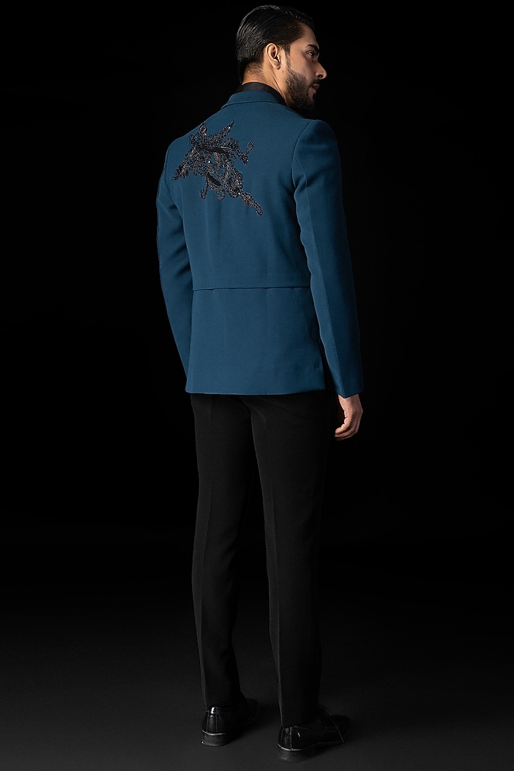 Teal Blue Stretchable Fabric Cutdana Embroidered Tuxedo Set by PAARSH at Pernia's Pop Up Shop