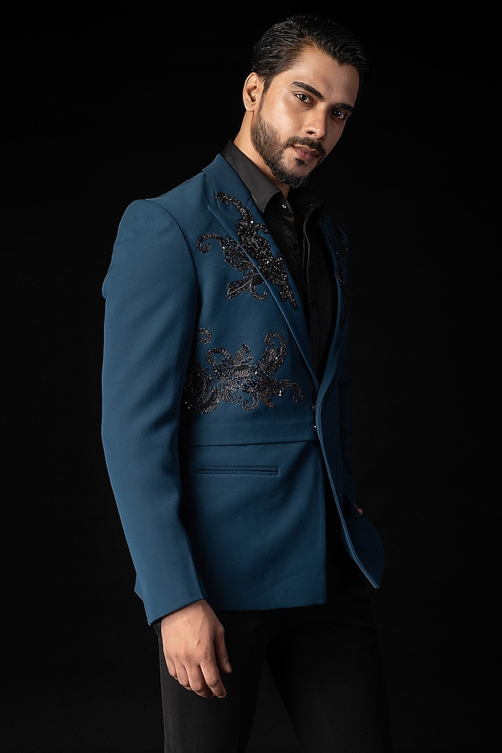 Teal Blue Stretchable Fabric Cutdana Embroidered Tuxedo Set by PAARSH at Pernia's Pop Up Shop