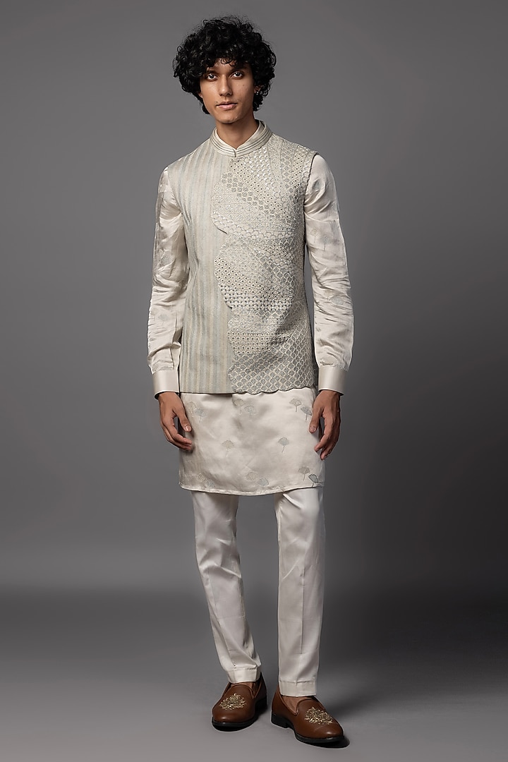 Light Grey Linen Satin Cutdana Embroidered Asymmetric Nehru Jacket Set by PAARSH