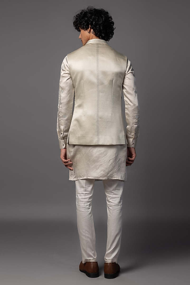 Light Grey Linen Satin Cutdana Embroidered Asymmetric Nehru Jacket Set by PAARSH at Pernia's Pop Up Shop