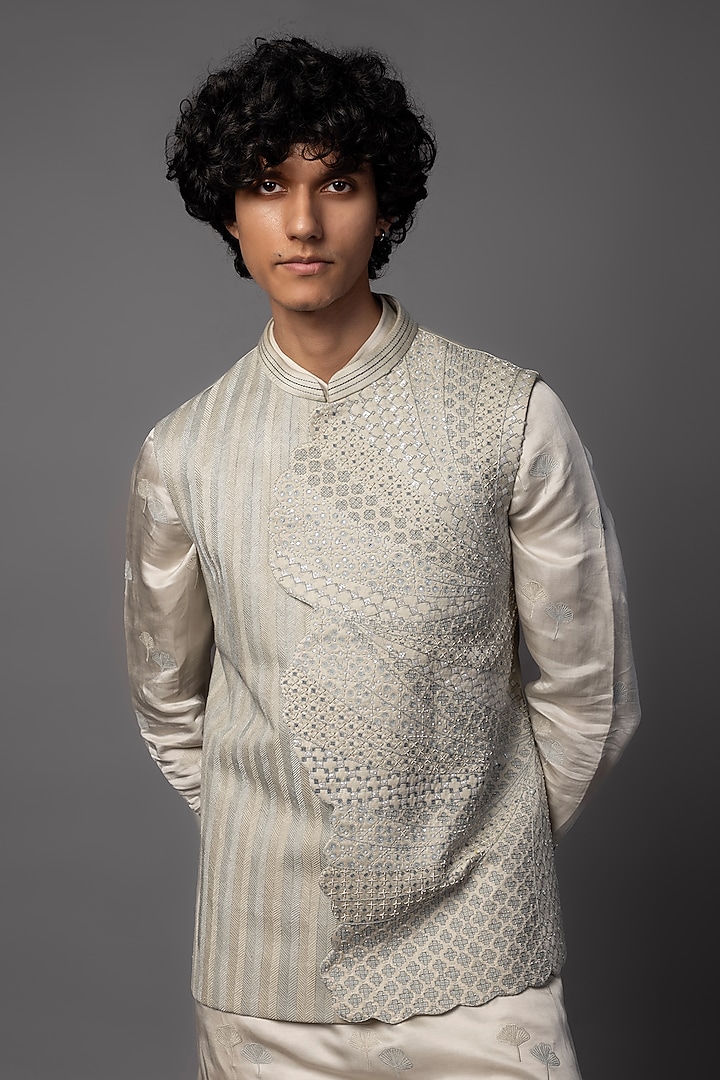 Light Grey Linen Satin Cutdana Embroidered Asymmetric Nehru Jacket Set by PAARSH at Pernia's Pop Up Shop