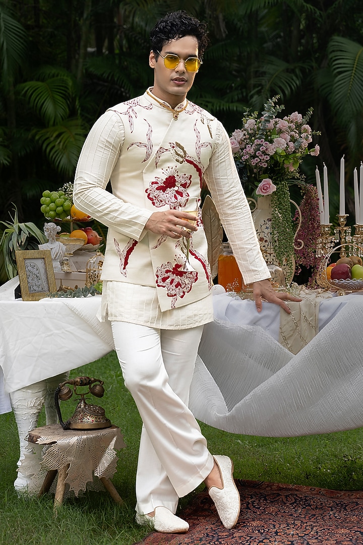 Ivory Linen Satin Hand Embroidered Bundi Jacket Set by PAARSH at Pernia's Pop Up Shop