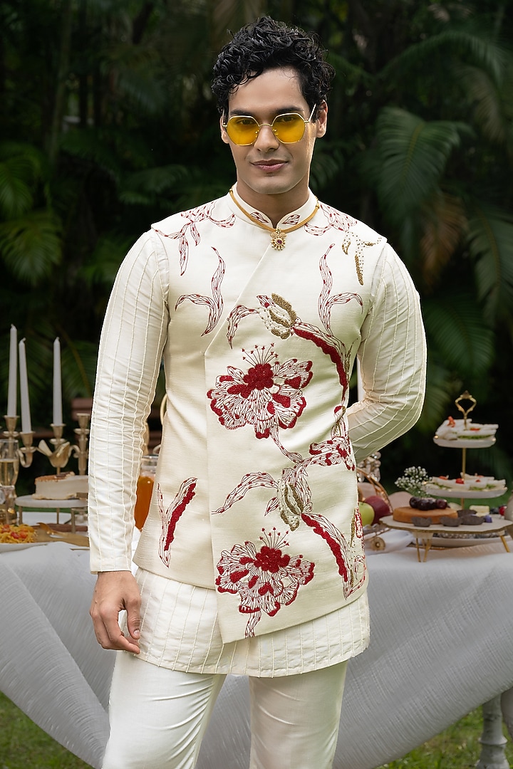 Ivory Linen Satin Hand Embroidered Bundi Jacket Set by PAARSH at Pernia's Pop Up Shop