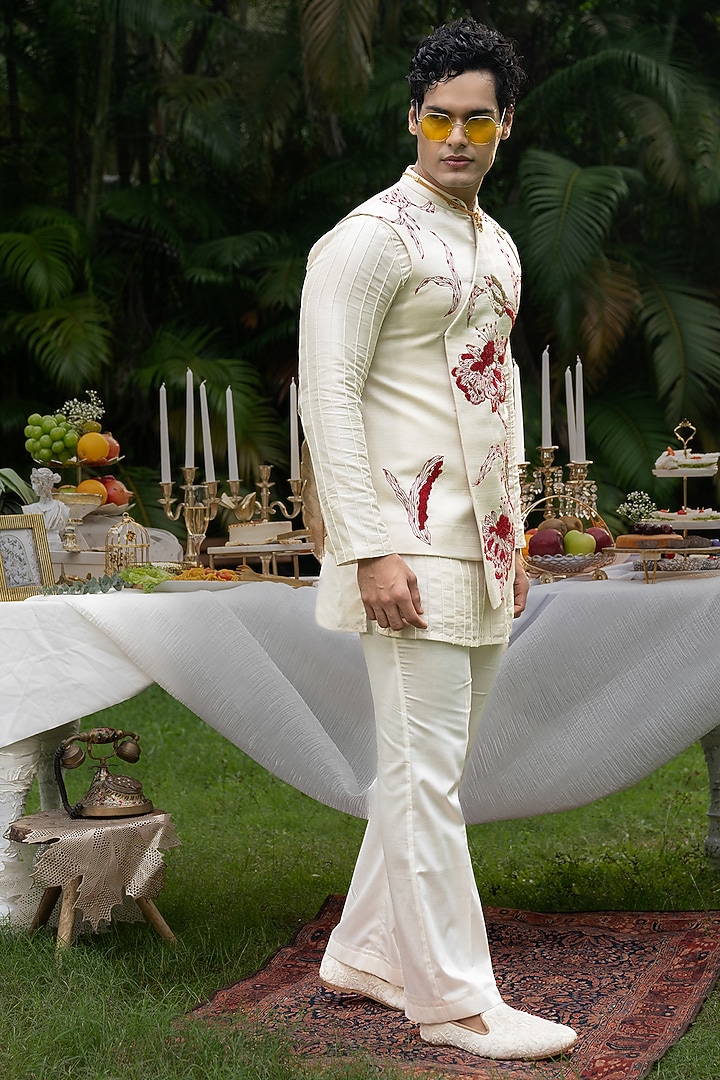 Ivory Linen Satin Hand Embroidered Bundi Jacket Set by PAARSH at Pernia's Pop Up Shop
