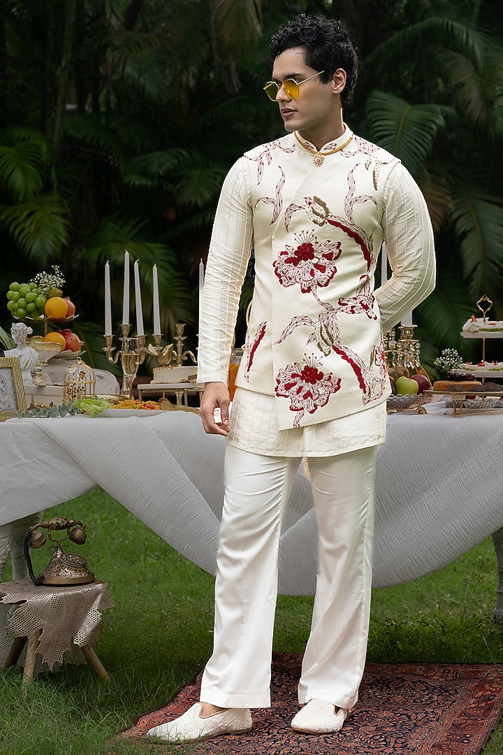 Ivory Linen Satin Hand Embroidered Bundi Jacket Set by PAARSH at Pernia's Pop Up Shop