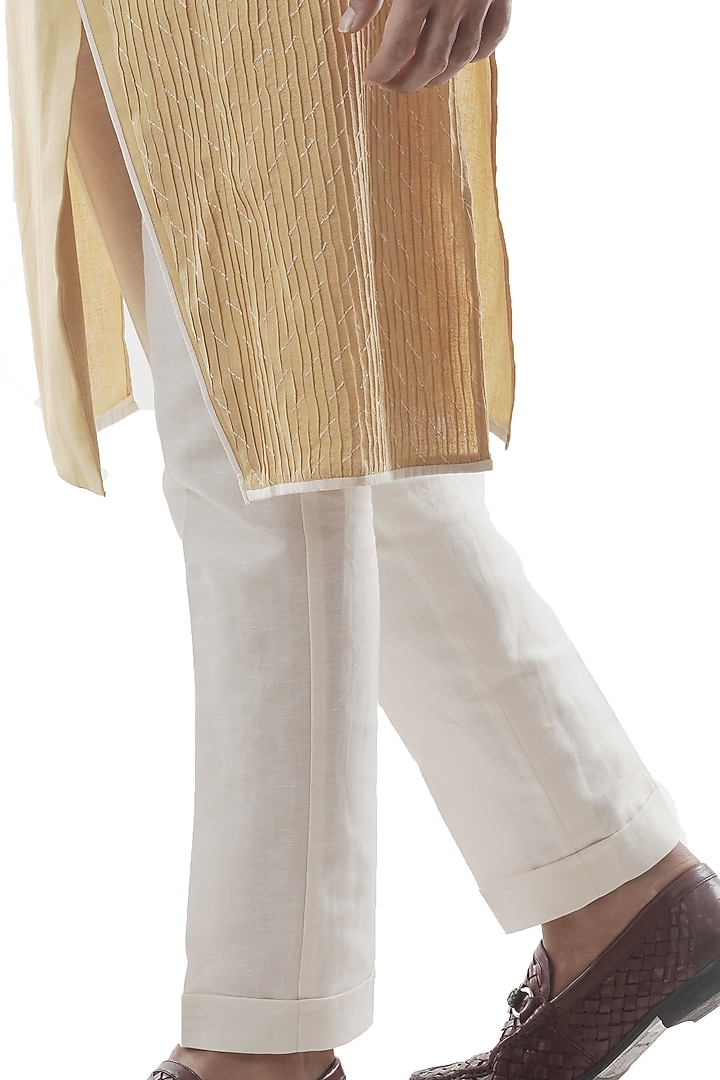 Mustard Khadi Linen Asymmertrical Kurta Set by PAARSH at Pernia's Pop Up Shop
