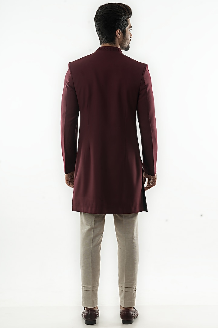 Red Wine Hand Embroidered Asymmetrical Achkan Jacket Set by PAARSH at Pernia's Pop Up Shop