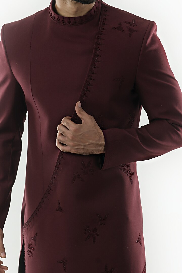 Red Wine Hand Embroidered Asymmetrical Achkan Jacket Set by PAARSH at Pernia's Pop Up Shop
