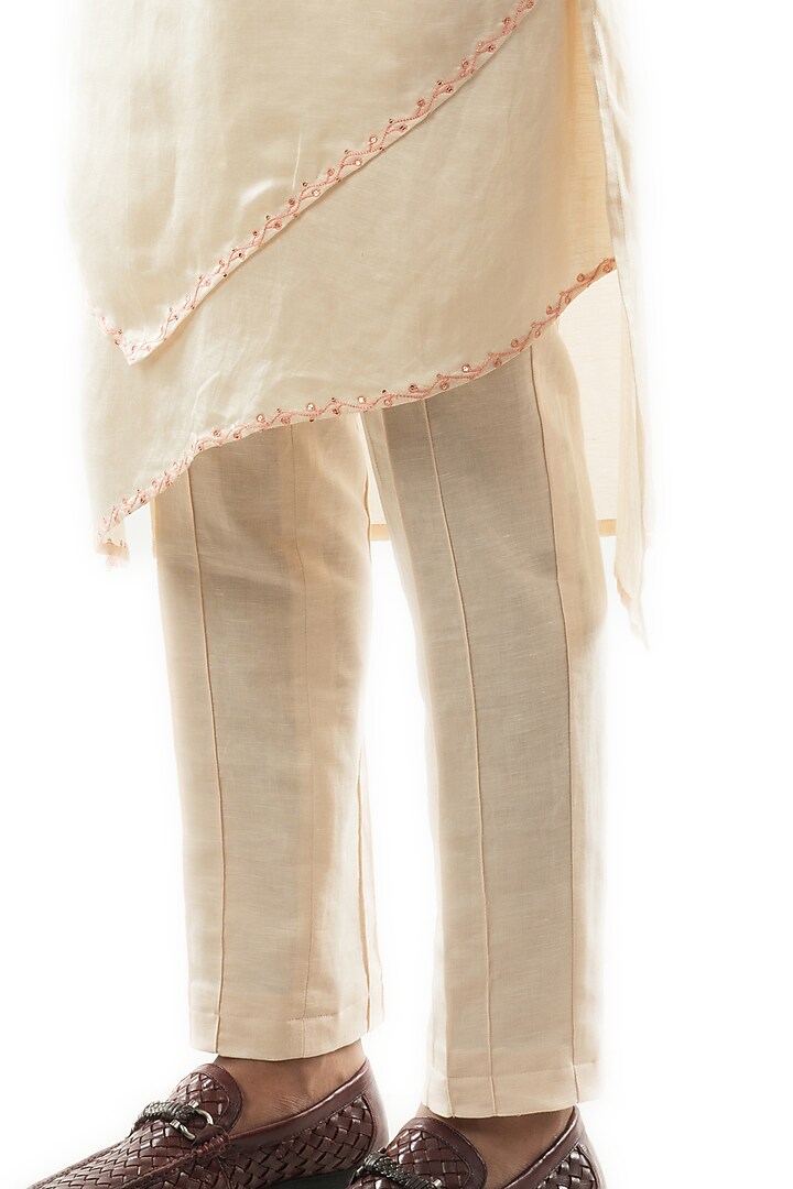 Cream Double-Paneled Kurta Set With Nehru Jacket by PAARSH at Pernia's Pop Up Shop