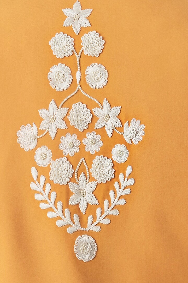 Mustard Terry Cotton Motif Embroidered Asymmetric Bundi Jacket by PAARSH at Pernia's Pop Up Shop