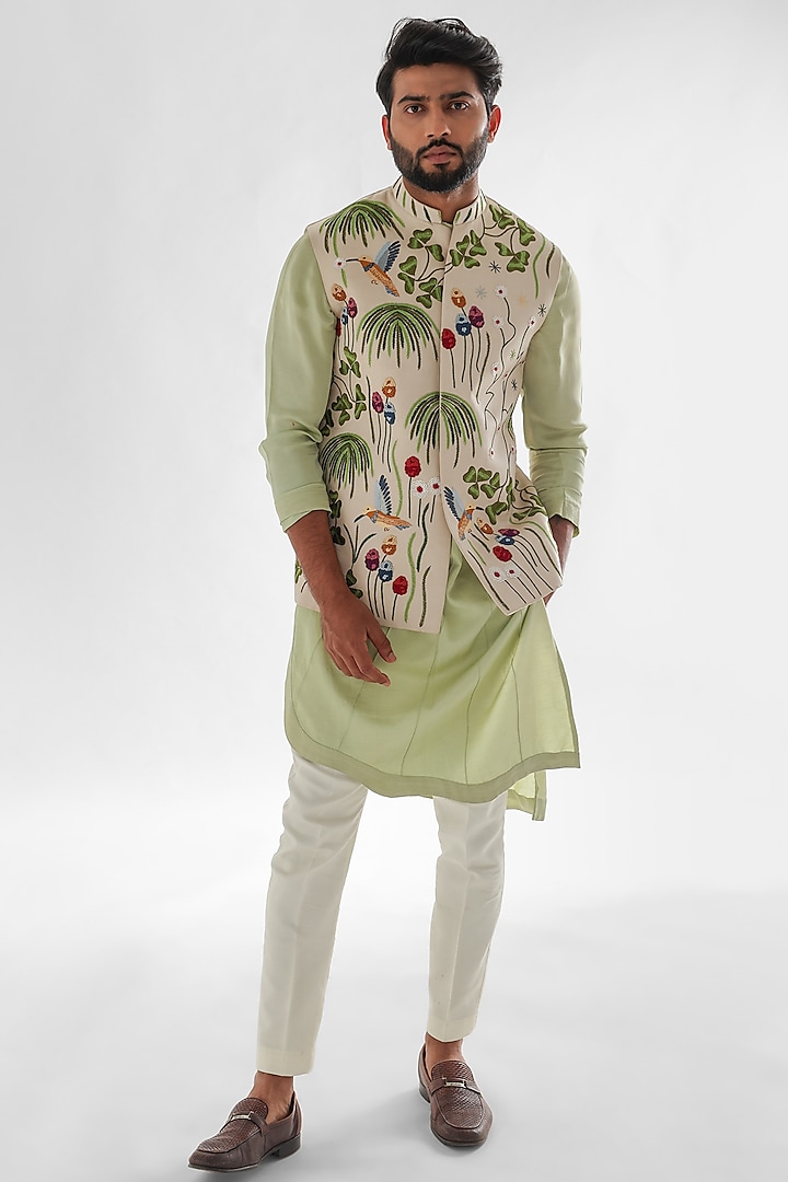 Cream Modal Satin Embroidered Nehru Jacket by PAARSH