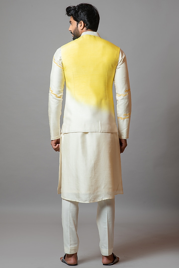 Cream & Unmellow Yellow Bamberg Silk Resham Embroidered Bundi Jacket by PAARSH at Pernia's Pop Up Shop