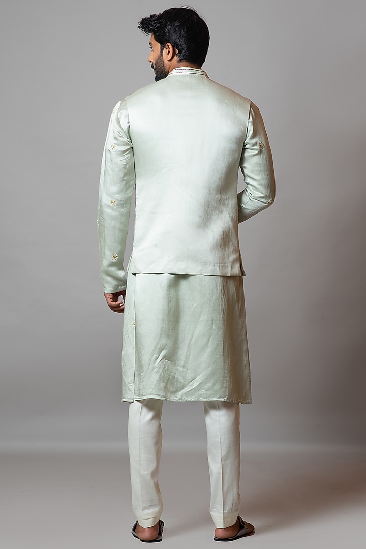 Glass Green Linen Satin Embroidered Bundi Jacket Set by PAARSH at Pernia's Pop Up Shop