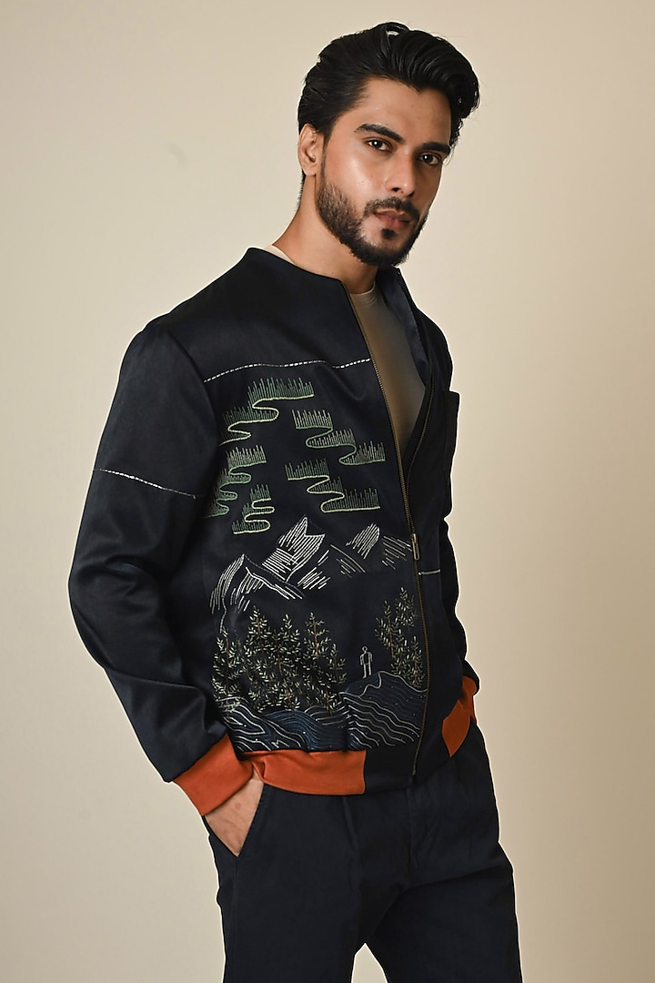 Navy Blue Satin Suiting Thread Embroidered Bomber jacket by PAARSH