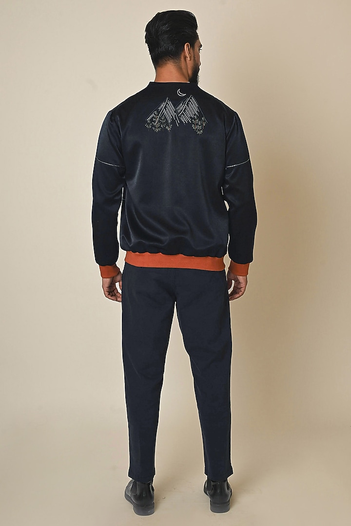 Navy Blue Satin Suiting Thread Embroidered Bomber jacket by PAARSH at Pernia's Pop Up Shop