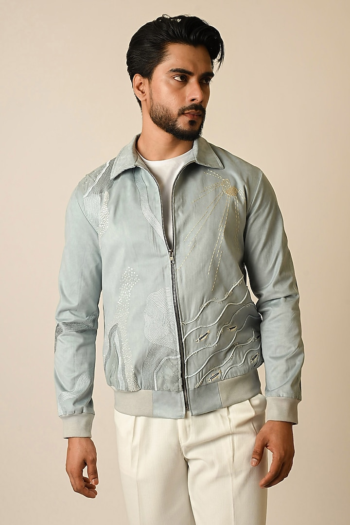 Baby Blue Suede Thread Embroidered Bomber Jacket by PAARSH