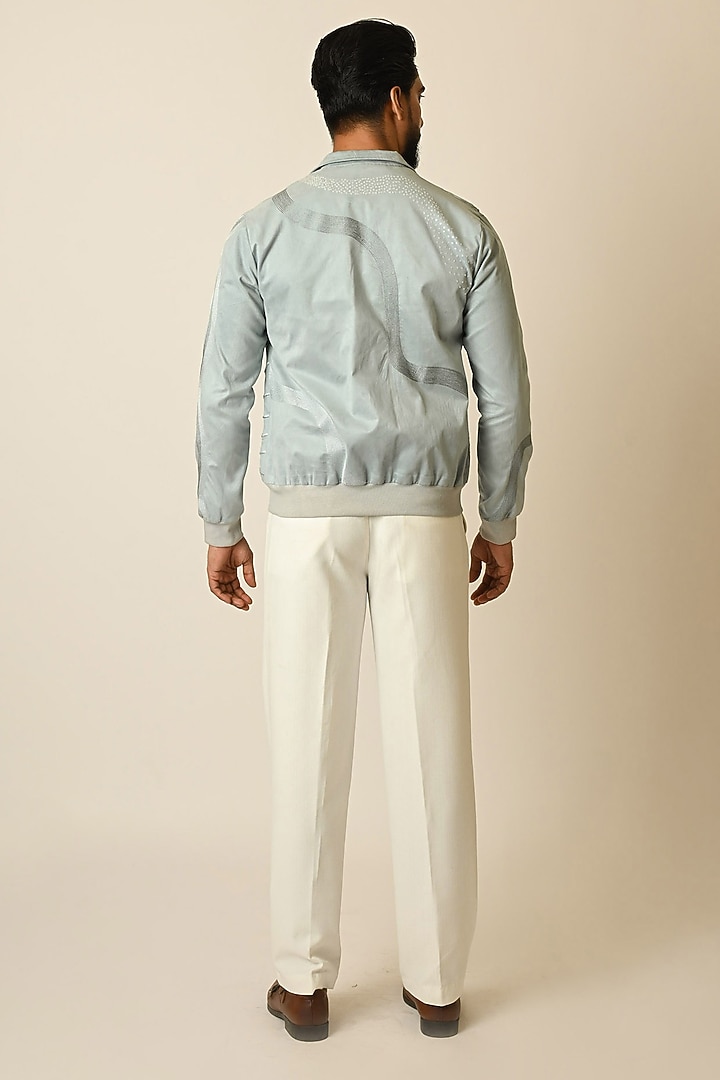 Baby Blue Suede Thread Embroidered Bomber Jacket by PAARSH at Pernia's Pop Up Shop
