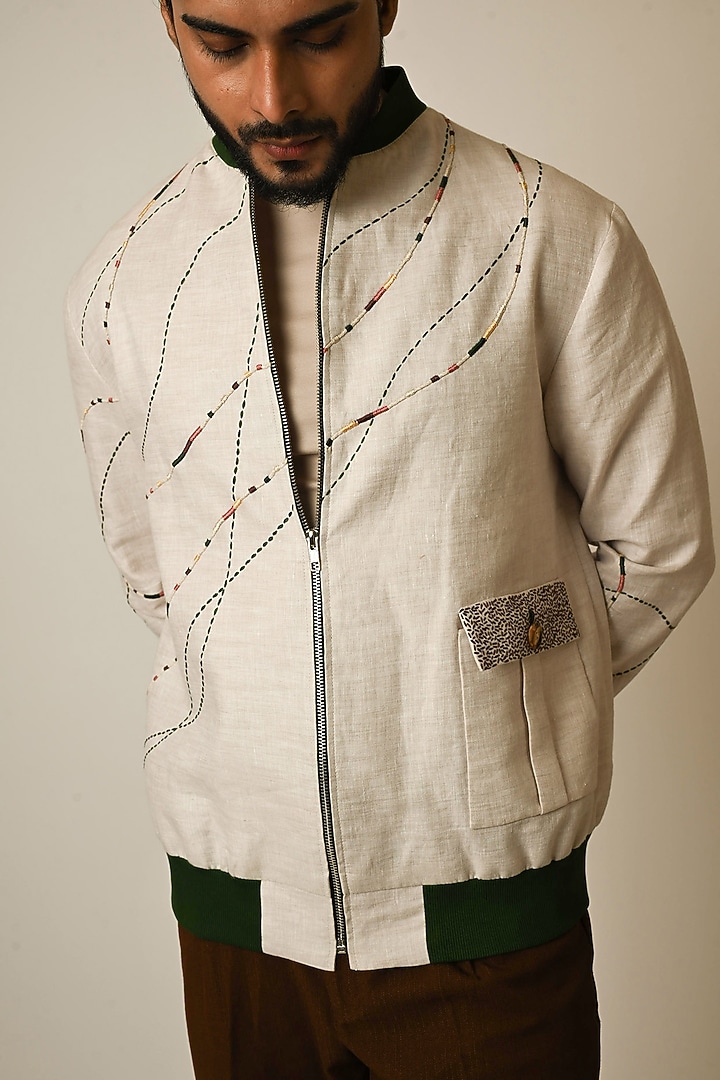 Dusty Beige Pure Linen Thread Embroidered Bomber Jacket by PAARSH at Pernia's Pop Up Shop