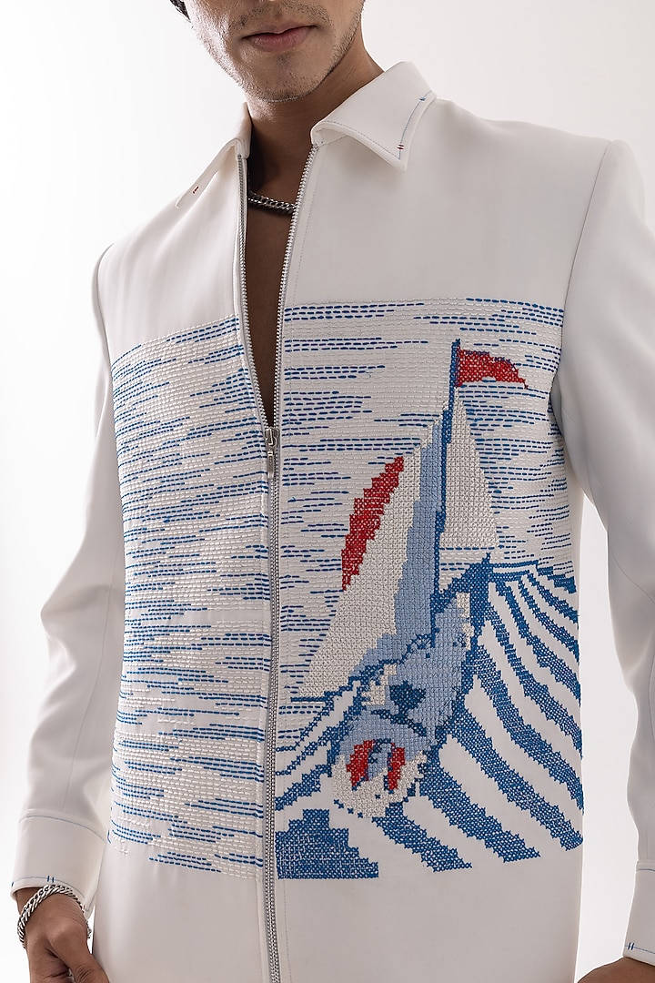 Ivory D&J Stretchable Cross-Stitch Embroidered Bomber Jacket by PAARSH at Pernia's Pop Up Shop