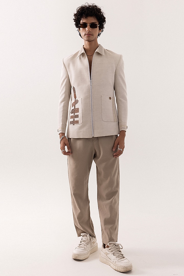 Beige Linen Embroidered Bomber Jacket by PAARSH at Pernia's Pop Up Shop