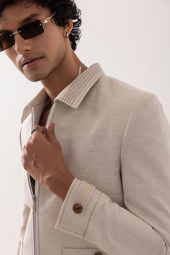 Beige Linen Embroidered Bomber Jacket by PAARSH at Pernia's Pop Up Shop