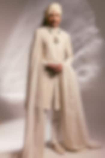 Ivory Raw Silk Resham Embroidered Groom Sherwani Set by PAARSH at Pernia's Pop Up Shop