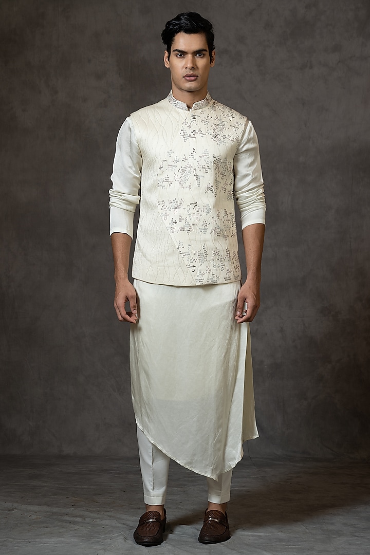 Ivory Embroidered Asymmetric Bundi Jacket by PAARSH