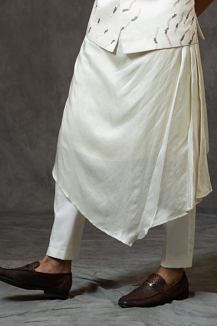 Ivory Linen Satin Sequins Embroidered Bundi Jacket by PAARSH at Pernia's Pop Up Shop