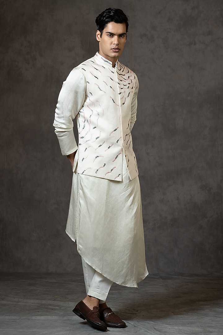 Ivory Linen Satin Sequins Embroidered Bundi Jacket by PAARSH at Pernia's Pop Up Shop