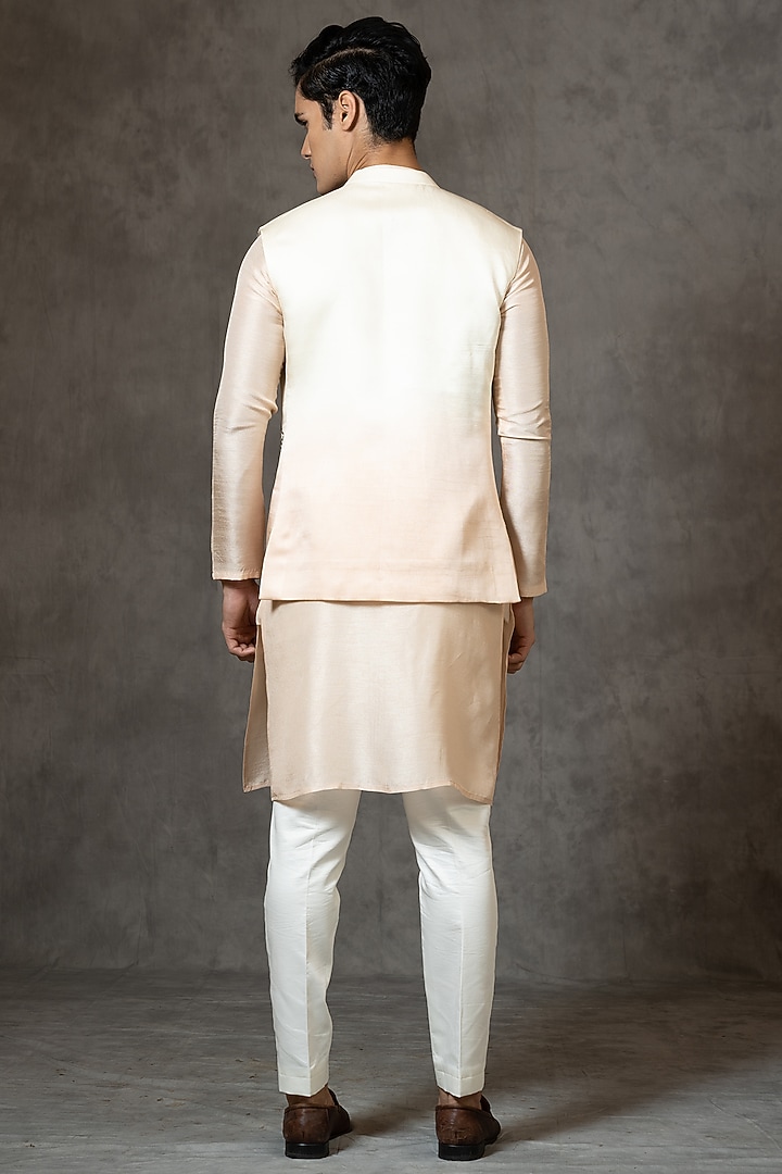 Cream & Peach Embroidered Bundi Jacket With Kurta Set by PAARSH at Pernia's Pop Up Shop